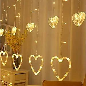 LED Heart Shape Curtain String Lights with 8 Flashing Modes Decoration (12 Hearts, Warm White).