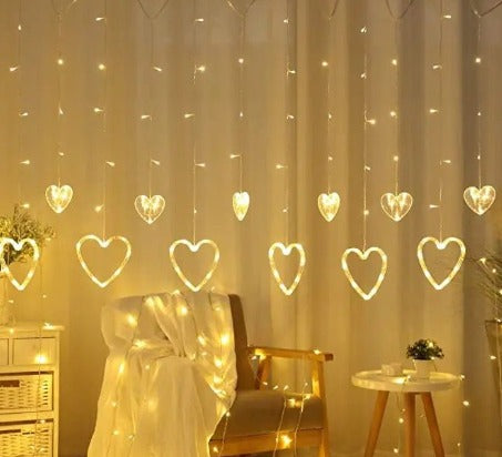 LED Heart Shape Curtain String Lights with 8 Flashing Modes Decoration (12 Hearts, Warm White).